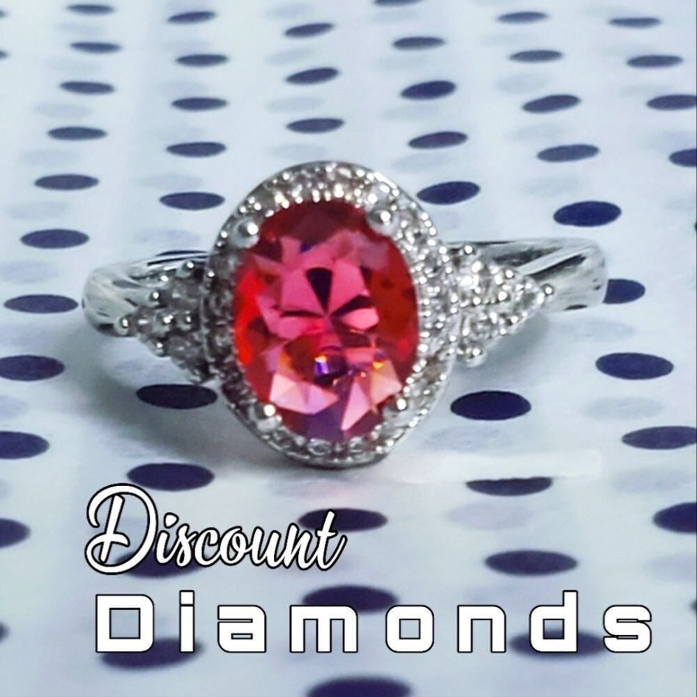 Oval Red Ruby Ring with Clusters of White Baguette Diamonds on 925 Silver